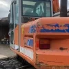 Escavatore gommato