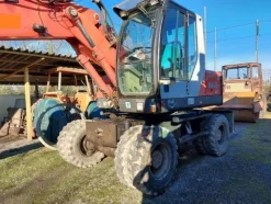 8#6932 Escavatore gommato O&K