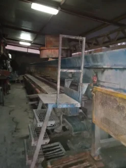 Impianto per la produzione di travi in latero cemento