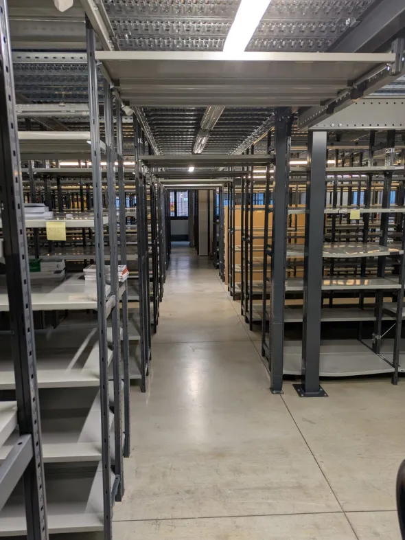 Impianto scaffalature metalliche con soppalco