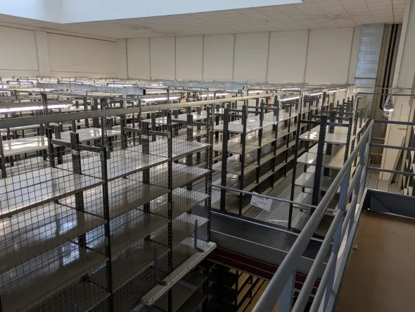Impianto scaffalature metalliche con soppalco