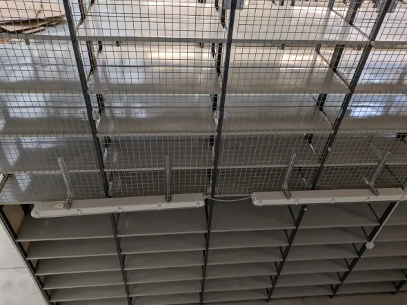 Impianto scaffalature metalliche con soppalco