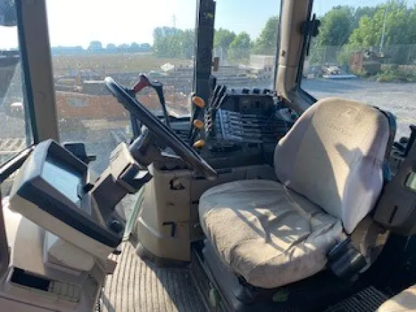 John Deere 6310 AS/1 con braccio Ferri