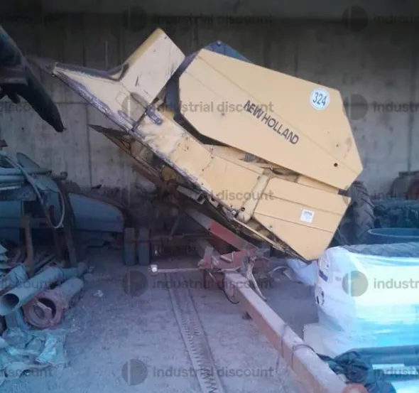 1#10155 Mietitrebbia New Holland TX66 e Barra da mais Capello Quasar