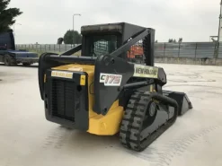 Minipala Cingolata New Holland C175