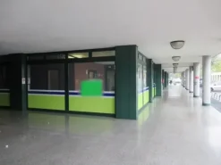 #8554 Porzione di negozio con garage in complesso polifunzionale