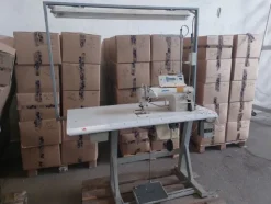 1#8180 Rimanenze di magazzino abbigliamento e macchine per confezionamento