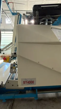 Stenditore automatico B.K.R con tavolo da taglio