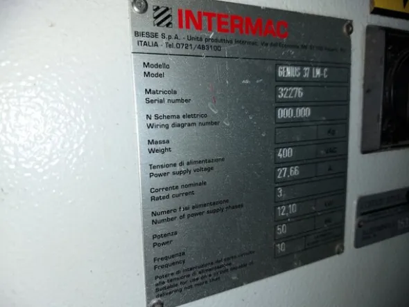 6#7592 Tavolo da taglio Intermac e lampada Biesse