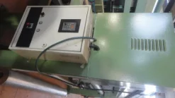 TESTA PER ACCOPPIATURA A POLVERE- POWDER BONDING HEAD