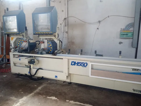 Troncatrice CNC doppia testa AUDATECH DH550 usata