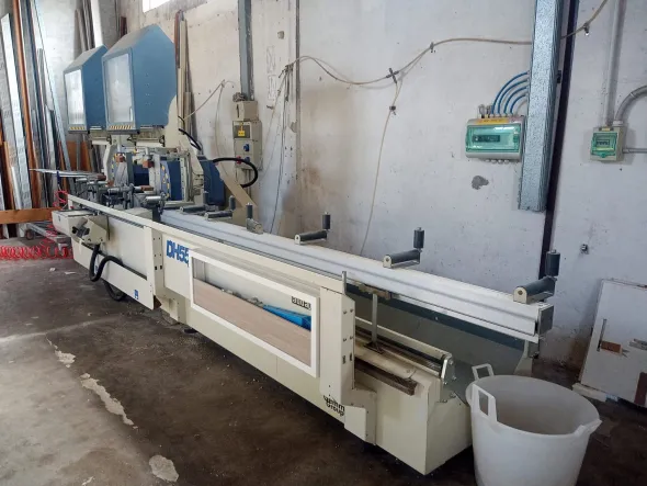 Troncatrice CNC doppia testa AUDATECH DH550 usata