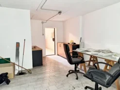 #23907 Ufficio al piano terra con cantina in complesso condominiale
