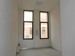 #20592 Un ufficio e diciannove posti auto